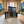 Rustic small nesting crates styled as farmhouse décor in an artistic room with painted walls.