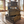 Rustic small nesting crates styled in a warm farmhouse interior with wood flooring and sunlight.