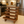 Rustic wooden spice rack in Medium Brown finish with 5-tier slatted shelves