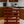Rustic wooden spice rack in Red Mahogany finish with 5-tier slatted shelves
