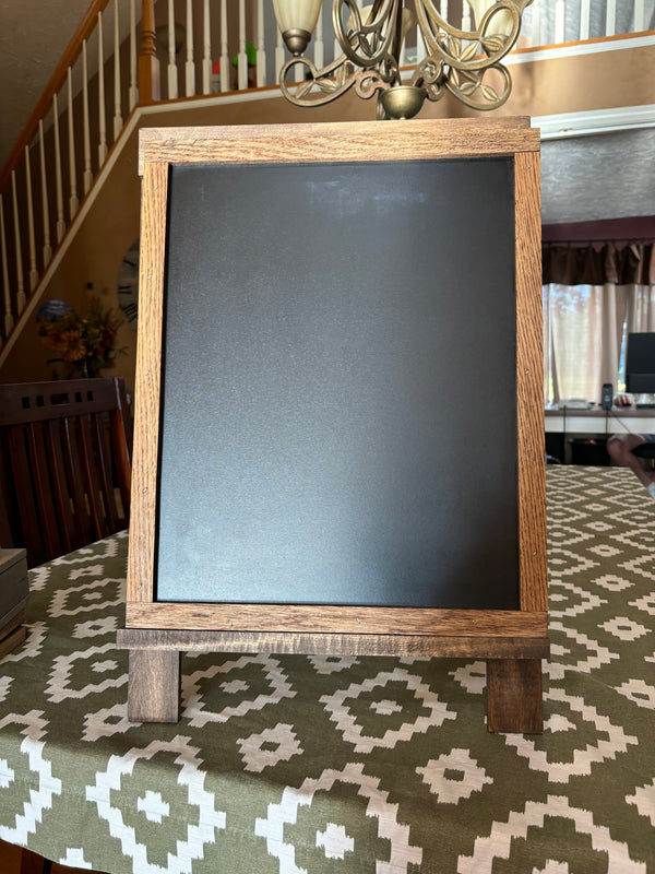 Rustic tabletop easel with chalkboard and handwritten message