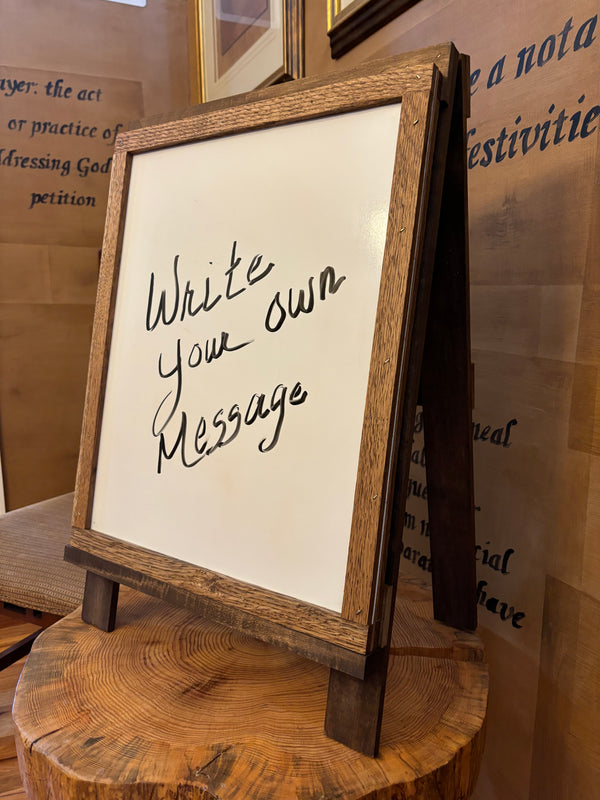 Side view of tabletop easel with whiteboard surface