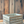 Rustic vintage blue stained wooden crate on wood backdrop for farmhouse storage.