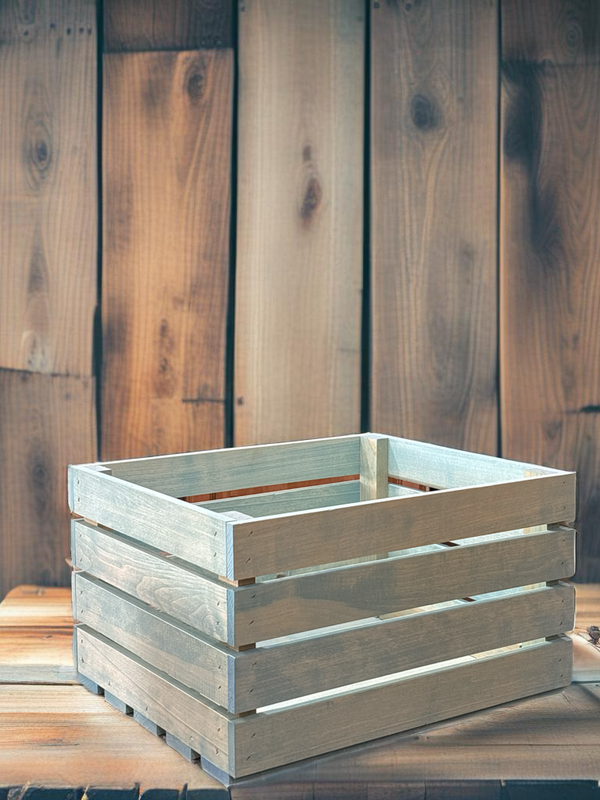 Rustic vintage blue stained wooden crate on wood backdrop for farmhouse storage.