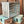 Vintage blue stained wood crate stacked on decorative boxes, farmhouse rustic storage.