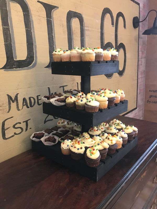 Rustic vintage dark stained wooden cupcake stand video showcasing a tiered dessert display for cakes, cupcakes, and treats at events and parties.